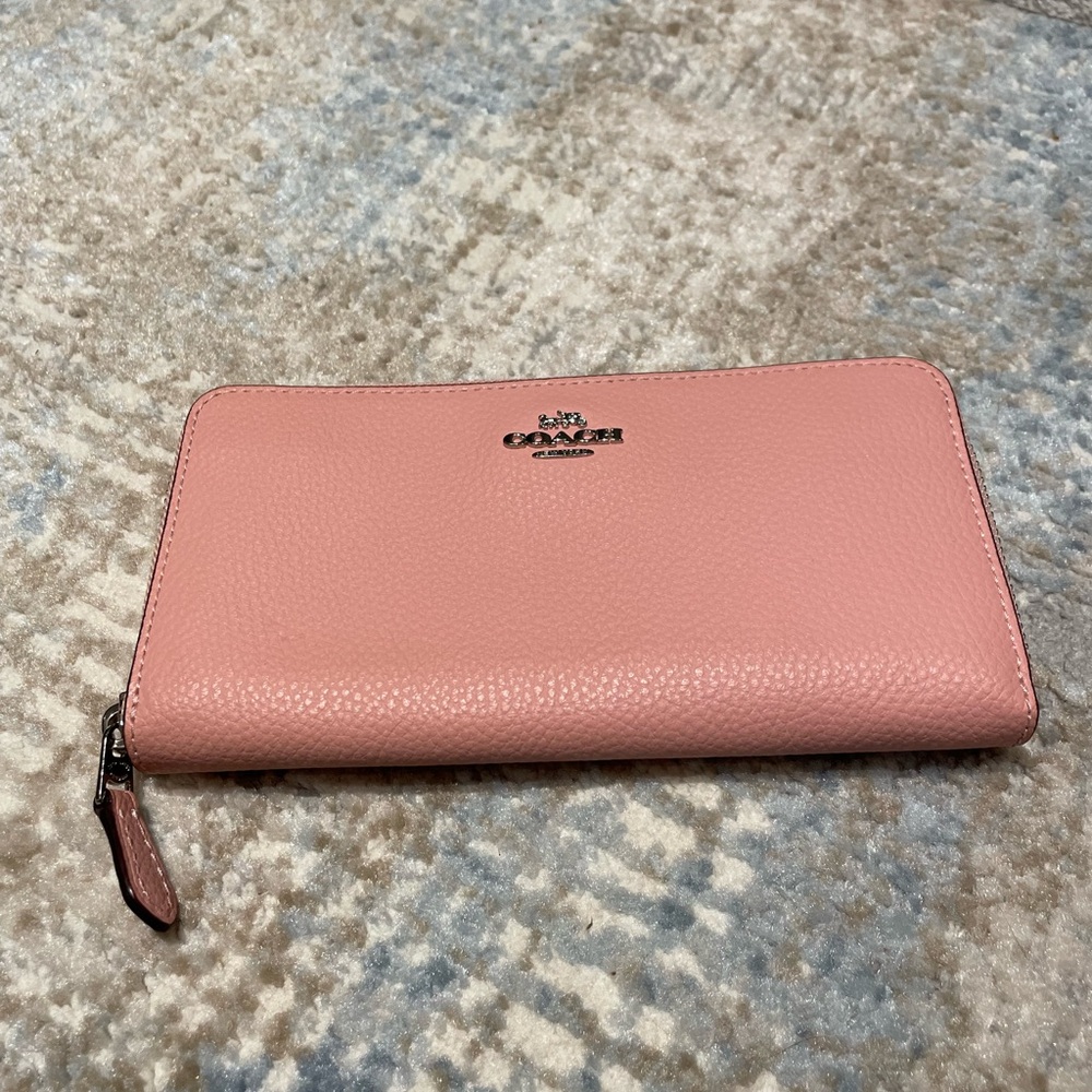 Coach leather wallet.
